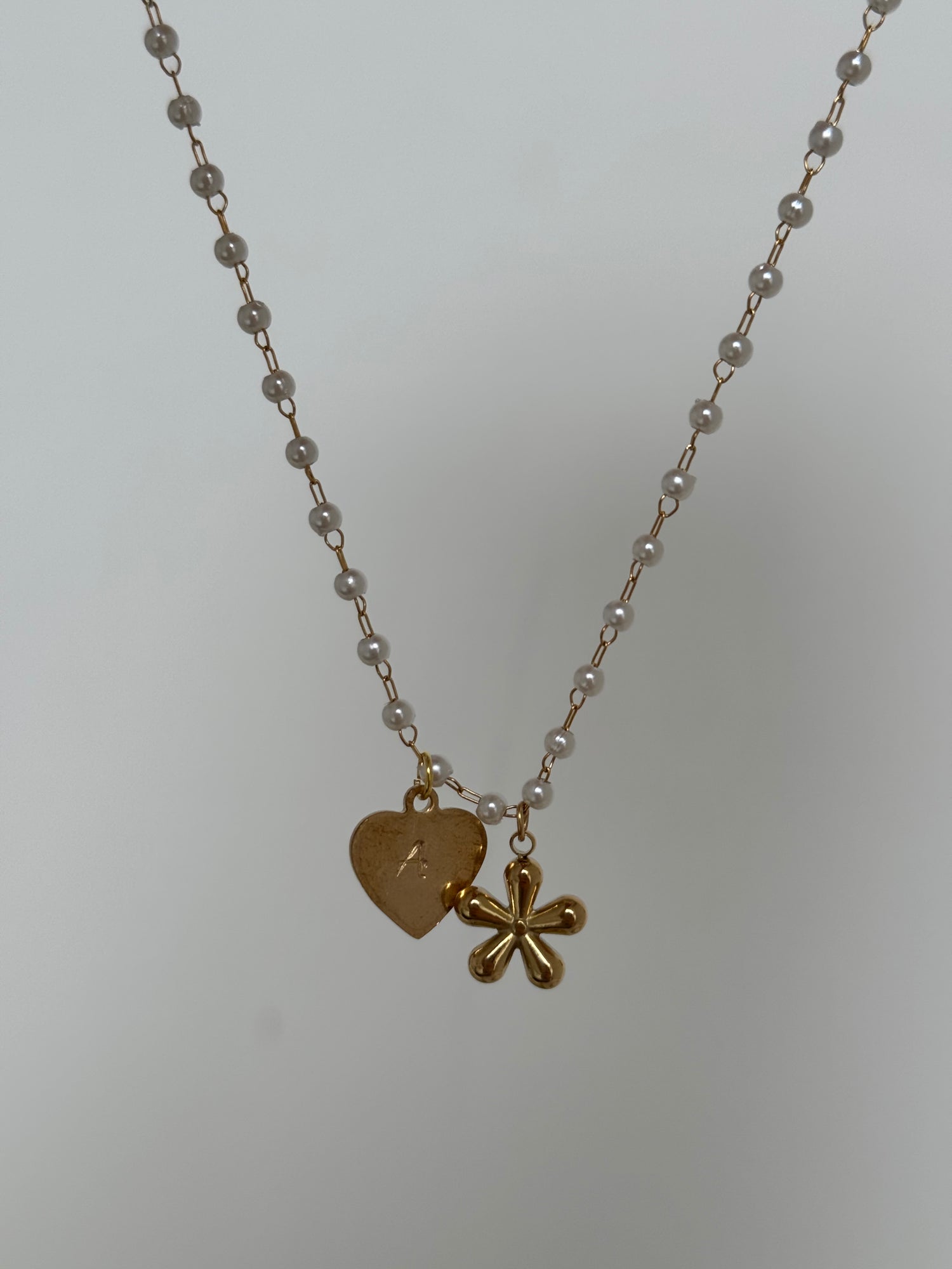 Collier estampillé avec breloque